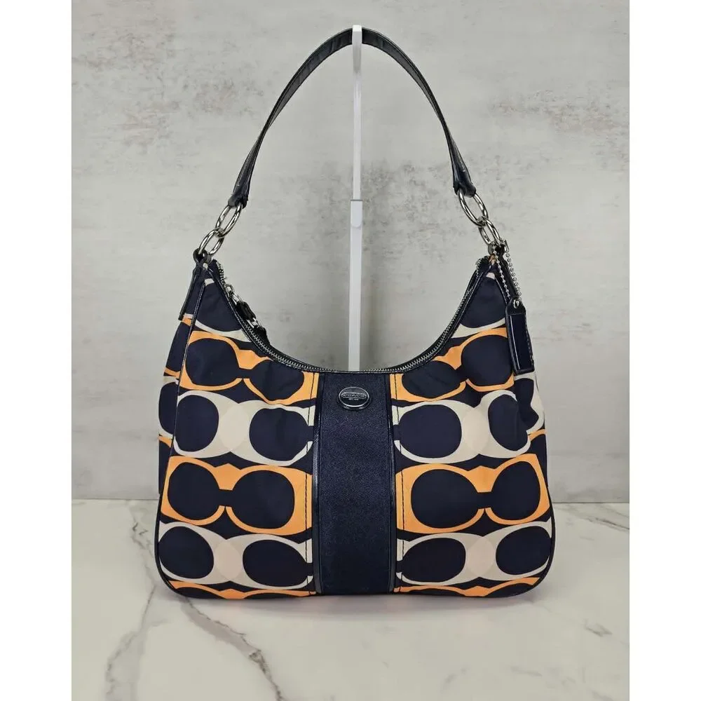 Coach Poppy Linear Signature 